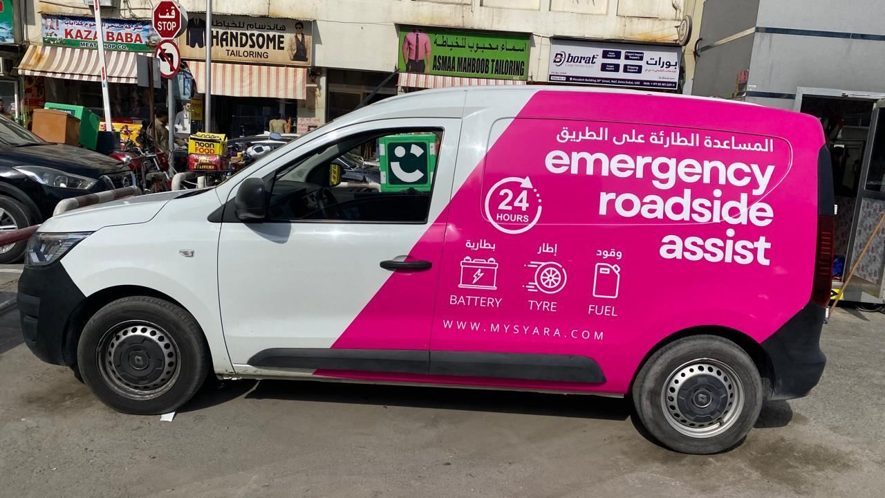 Roadside assistance van with bilingual Arabic and English branding in Dubai